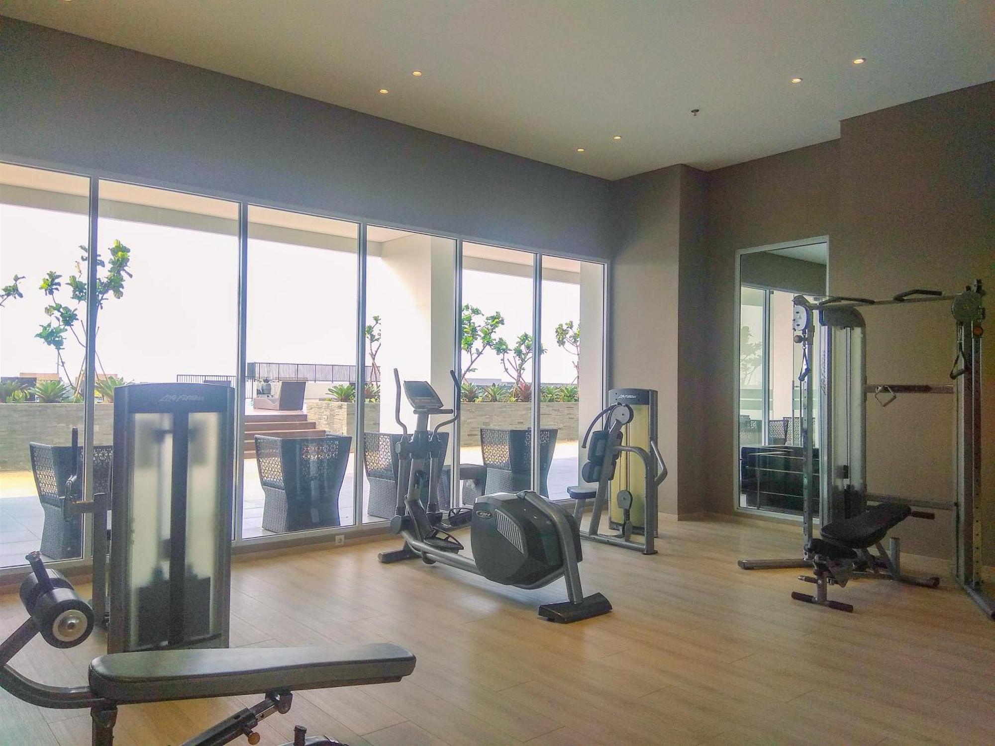 Modern Look And Warm At Vasanta Innopark By Travelio Apartemen